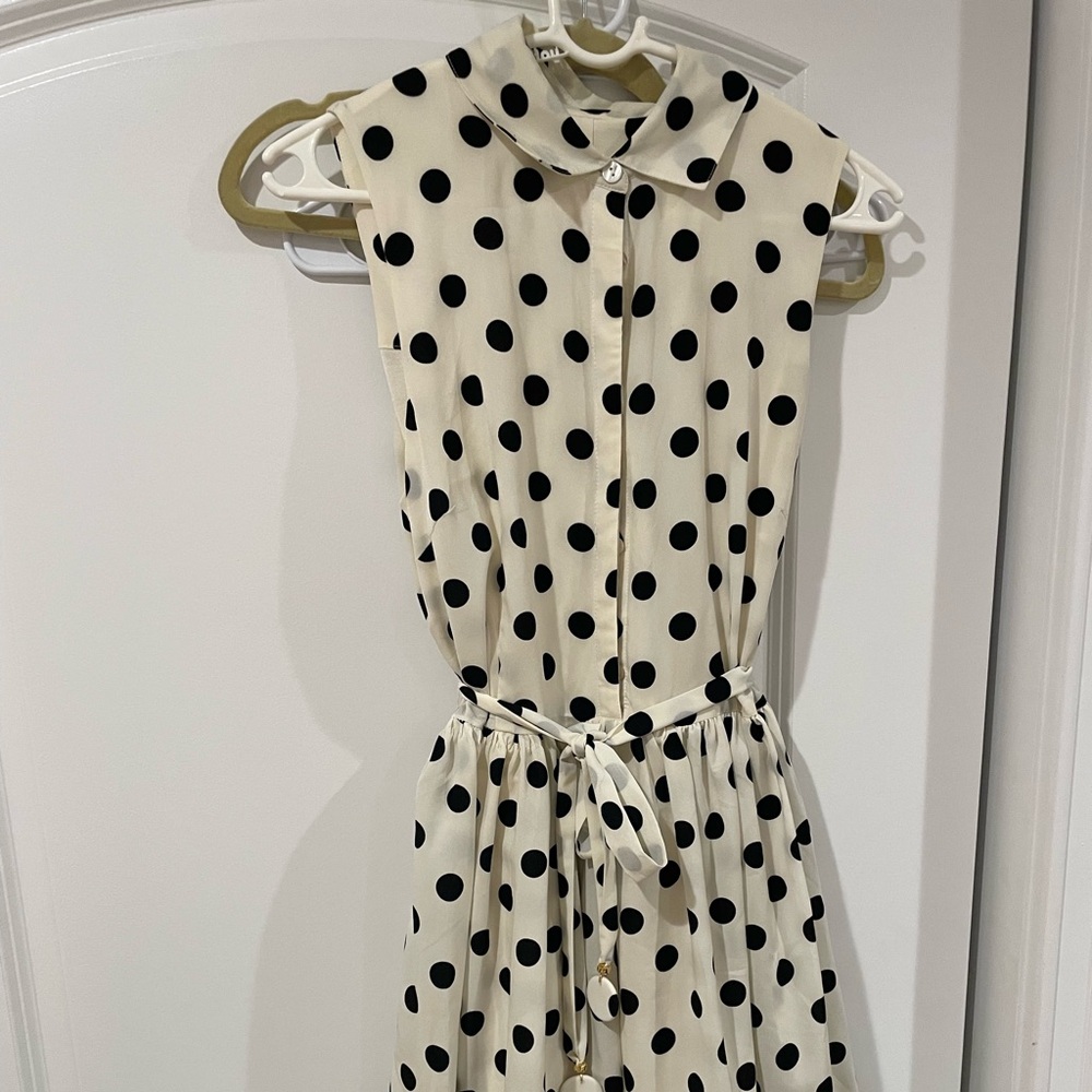 Sleeveless white with black dot dress